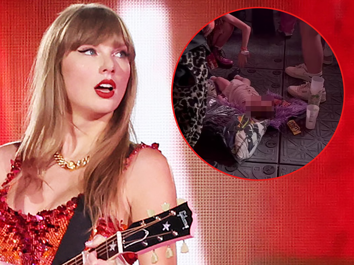 8910021a170f40d687d5caf91d9eeef3_md taylor swift baby on floor main-