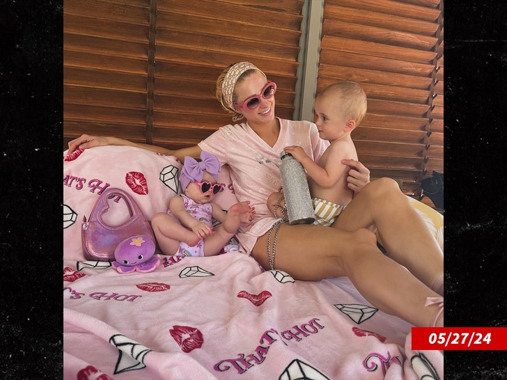 b7e76d6065db4fb49d7b009681f5cc0b_md-1 paris hilton