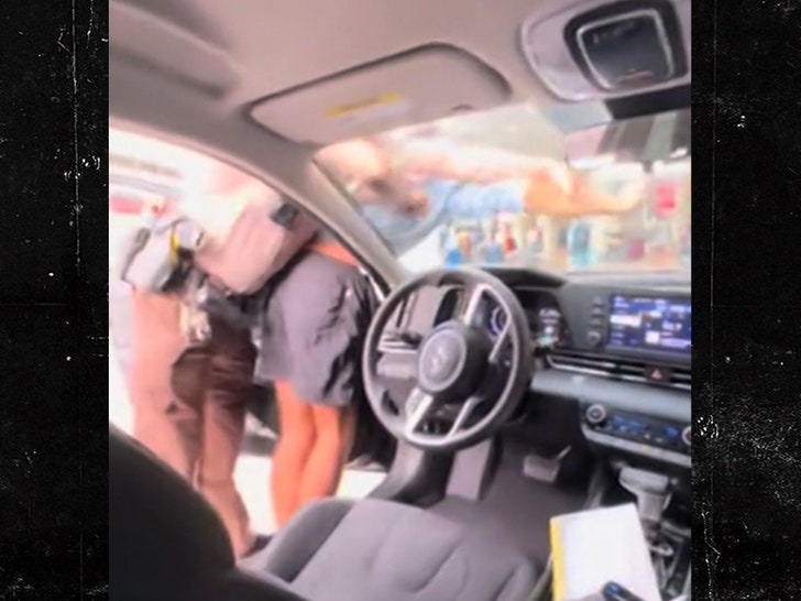 070824-uber-arrest-cuffed-primary-v1