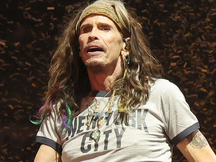 Steven Tyler wearing shirt that says