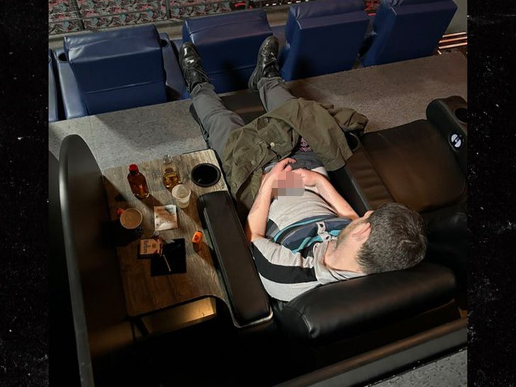 man jerking off in theatre