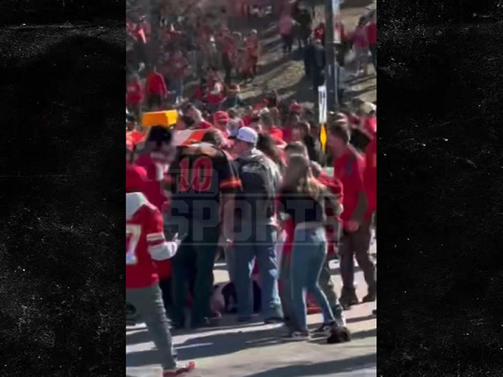 021524_kansas_city_shooting_kids_limping-man-on-the-ground