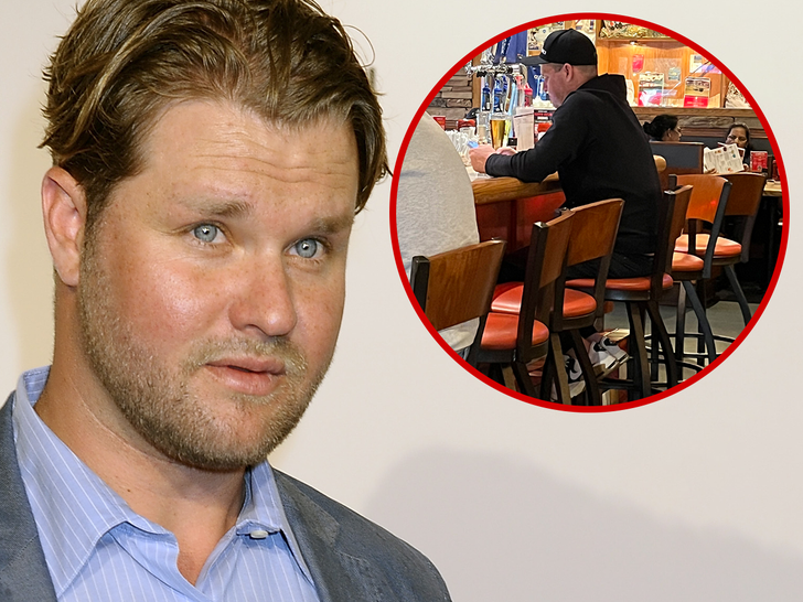 Zachery Ty Bryan close-up next to picture of Zachery sitting at Amigos/applebees