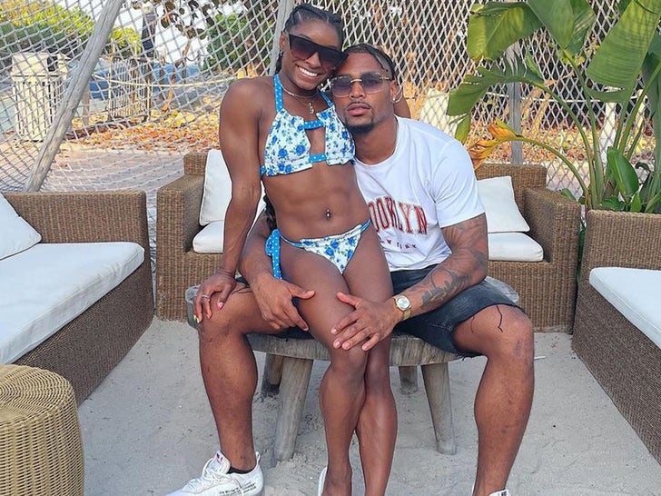 5a34d6b74d2a4fd3a9c0e69e40969e38_md Simone Biles and Jonathan Owens