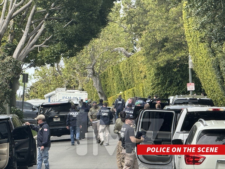 78db13cc915a4bb2b29570e6905f90aa_md p diddy police on the scene house