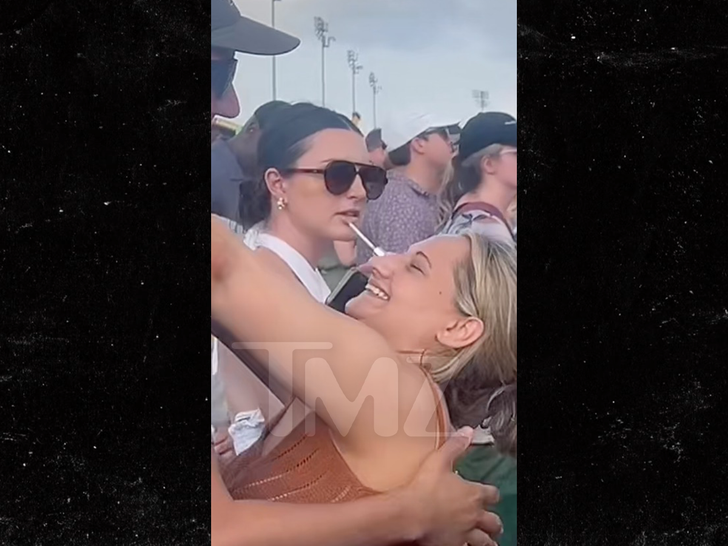 7b3e9192268141b79becabd13bc12796_md gypsy rose and ken at Jazz Fest in NOLA