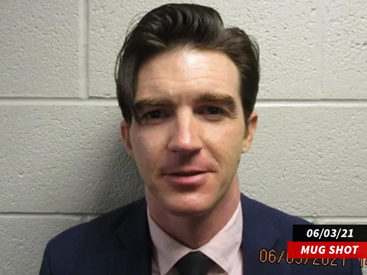 b41a89c1f2744678b80fb11f9a3c3576_md drake bell mug shot 06-03-21