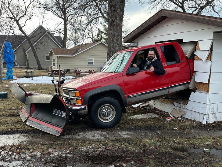 truck driving through house