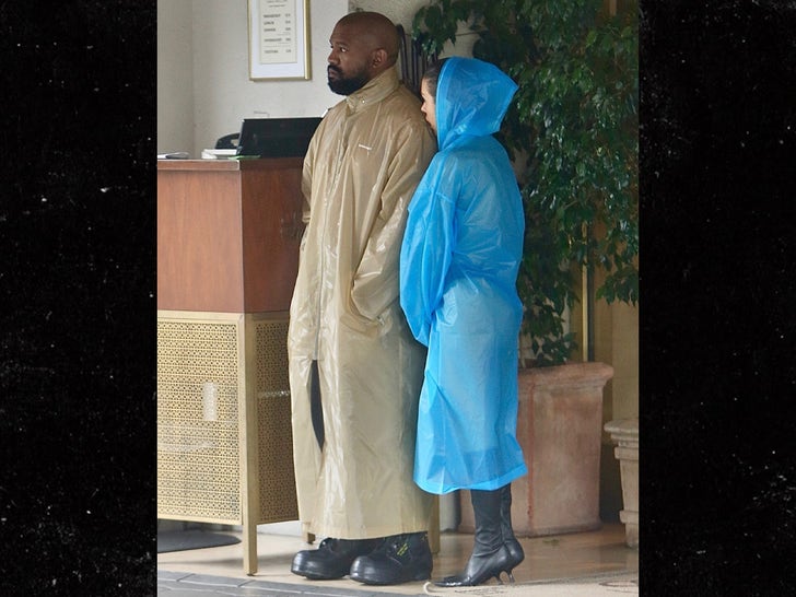 0123-Kanye-West-Bianca-Censori-Rain-Jacket-Coat-Poncho-photos-primary-3