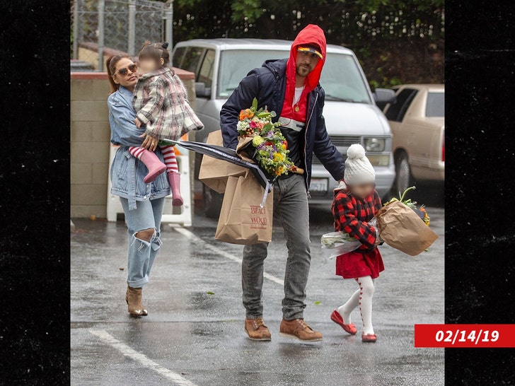 Eva Mendes with Ryan Gosling and their daughters