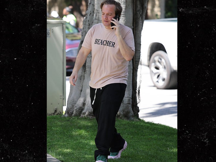 f741e58935a346c9ab07ed6de22af76a_md 0410-Jeff-Beacher-On-Phone-SUB