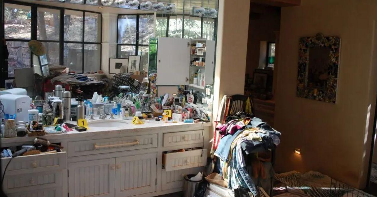 gene-hackman-crime-scene2-1769816707909 A sink was covered with various toiletries.