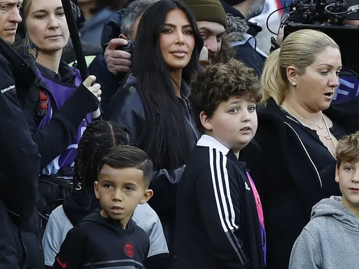 Kim Kardashian and Saint attend the Uber Eats Ligue 1 league match in Paris
