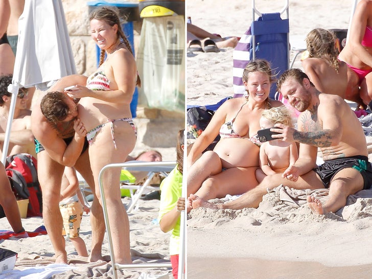 Conor McGregor Kisses Dee Devlin's Baby Bump During Beach Day With Family