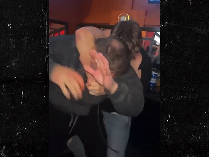 112623-thanksgiving-brawl-headlock-primary