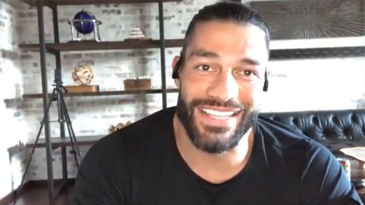 033121_roman_reigns_calvin_johnson_kal