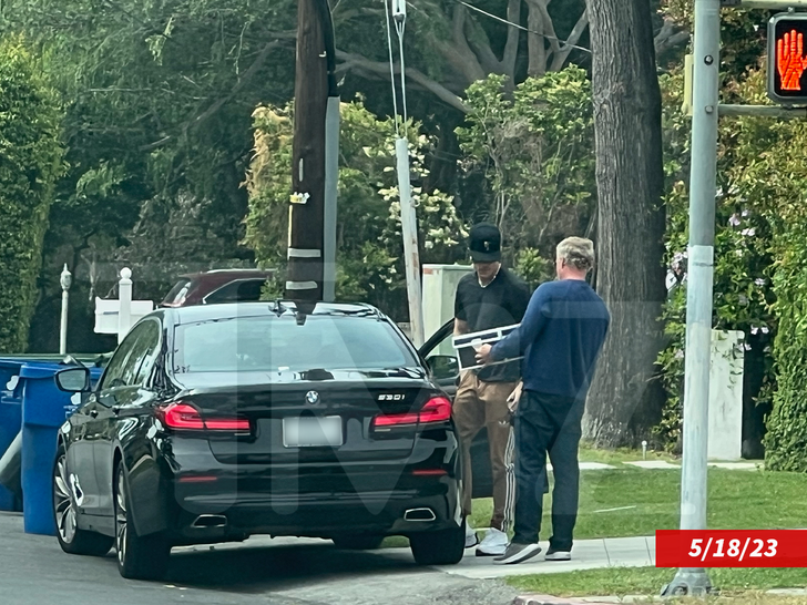 45f31f11bbf0491880c979863aff2043_md tom sandoval arriving home.