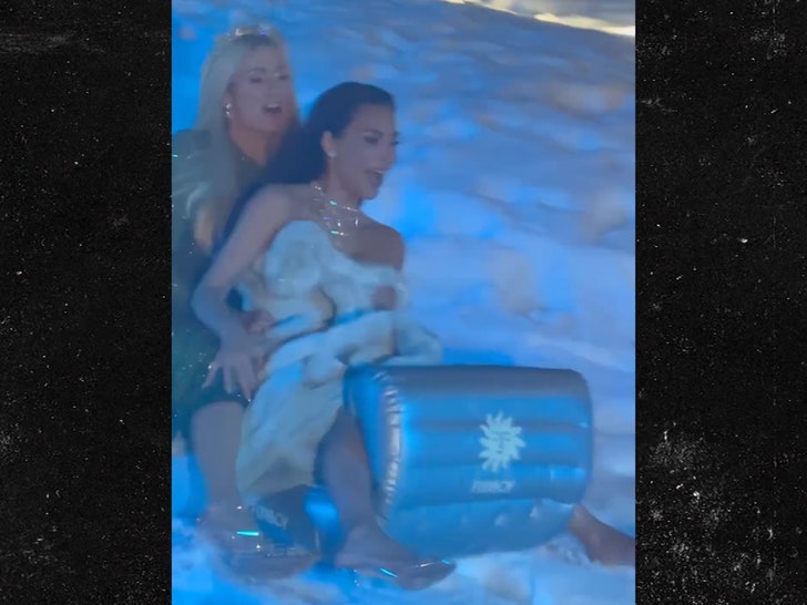 122523-kim-christmas-party-sledding-primary