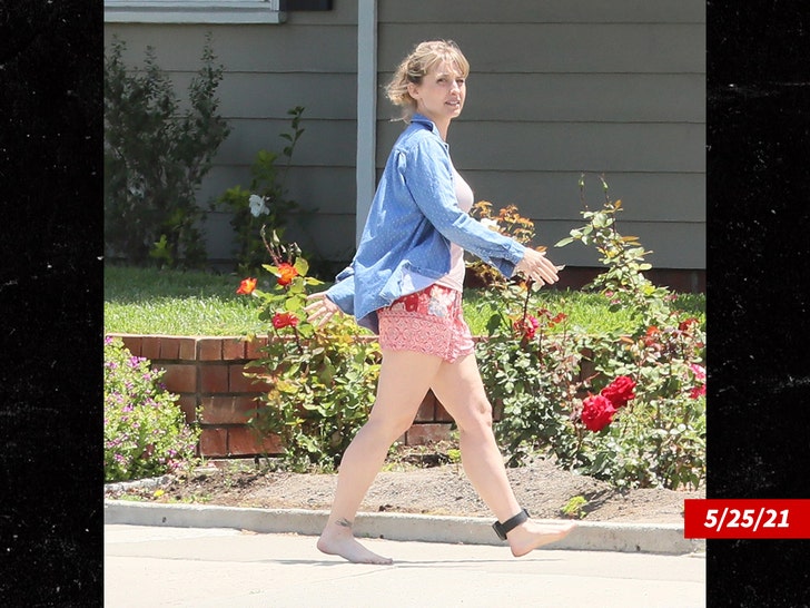 Allison Mack seen with tether