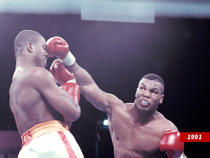 719fe0c58aef4e3aabfbc0b0a499e26d_md mike tyson