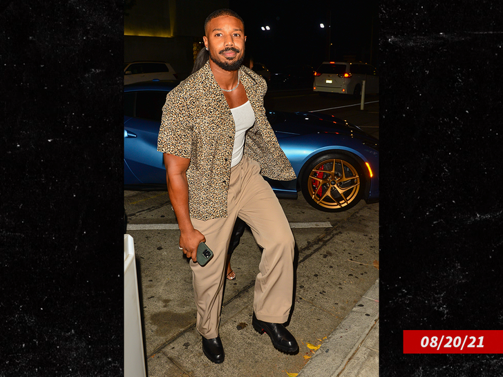 Michael B. Jordan blue ferrari