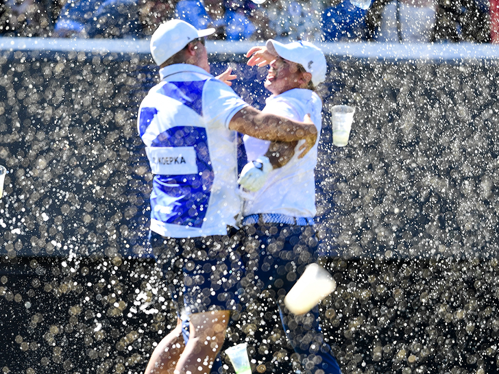 Chase Koepka of the Smash celebrates a hole in one with his caddie