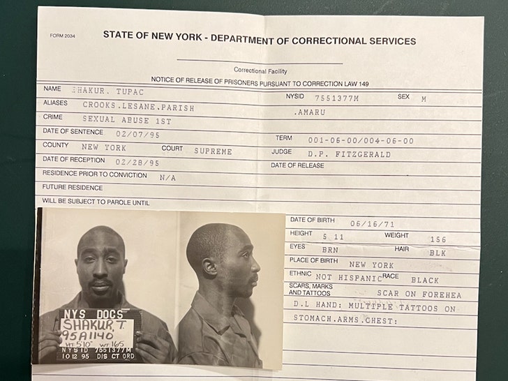 tupac mug shot moments in time 1