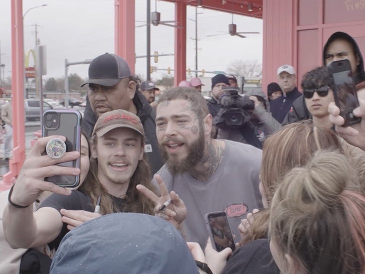 Post Malone Cuts Ribbon at Raising Cane’s He Designed
