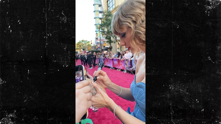 101223_taylor_swift_movie_tattoo_kal