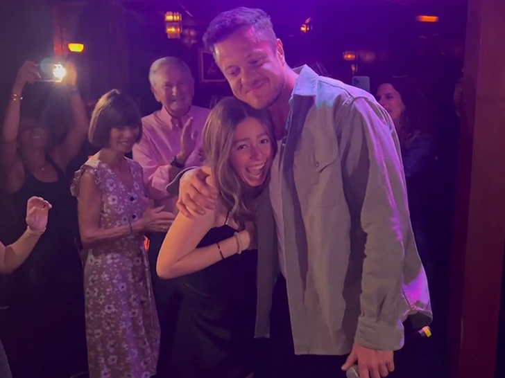 dan reynolds hug girl