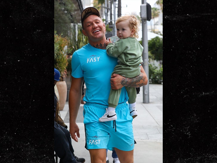 conor mcgregor holding son bg