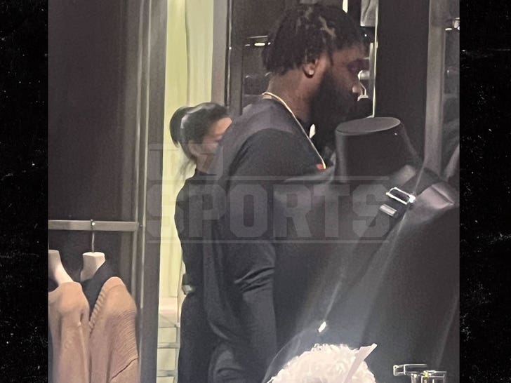 Navorro Bowman on a prada shopping spree