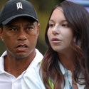 ce86e4130a43436b9eaf3b401261c8c7_xxs tiger woods and erica herman getty