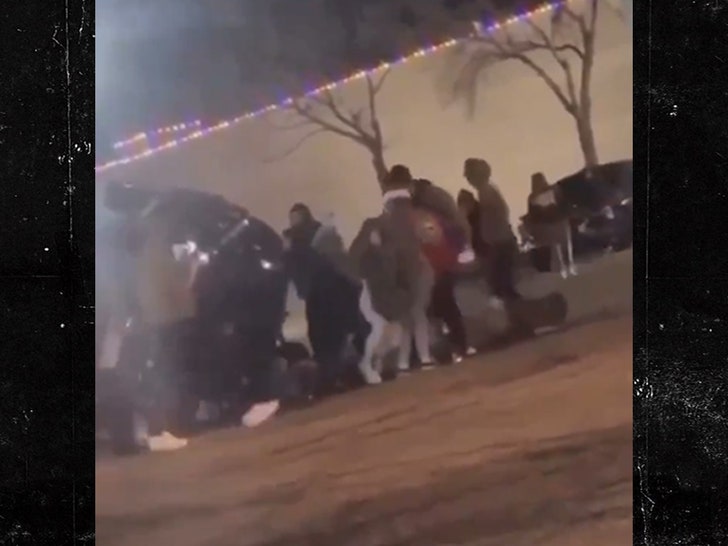 121923-car-flip-crowd-primary