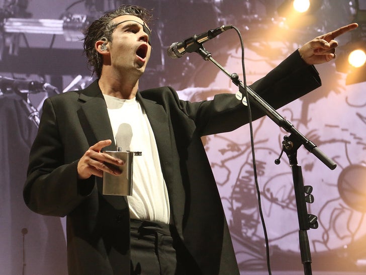 Matty Healy Drinks From A Flask On Stage After Swift Breakup